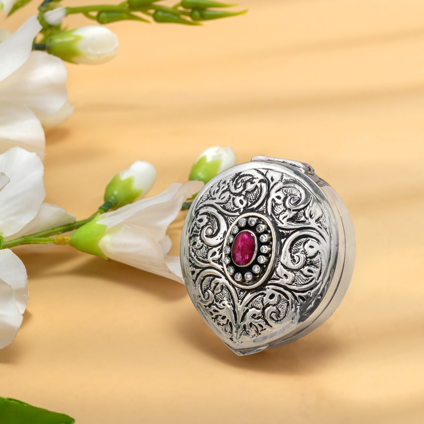 Handcrafted Antique Silver Chopra adorned with Elegant Semi-precious Stone
