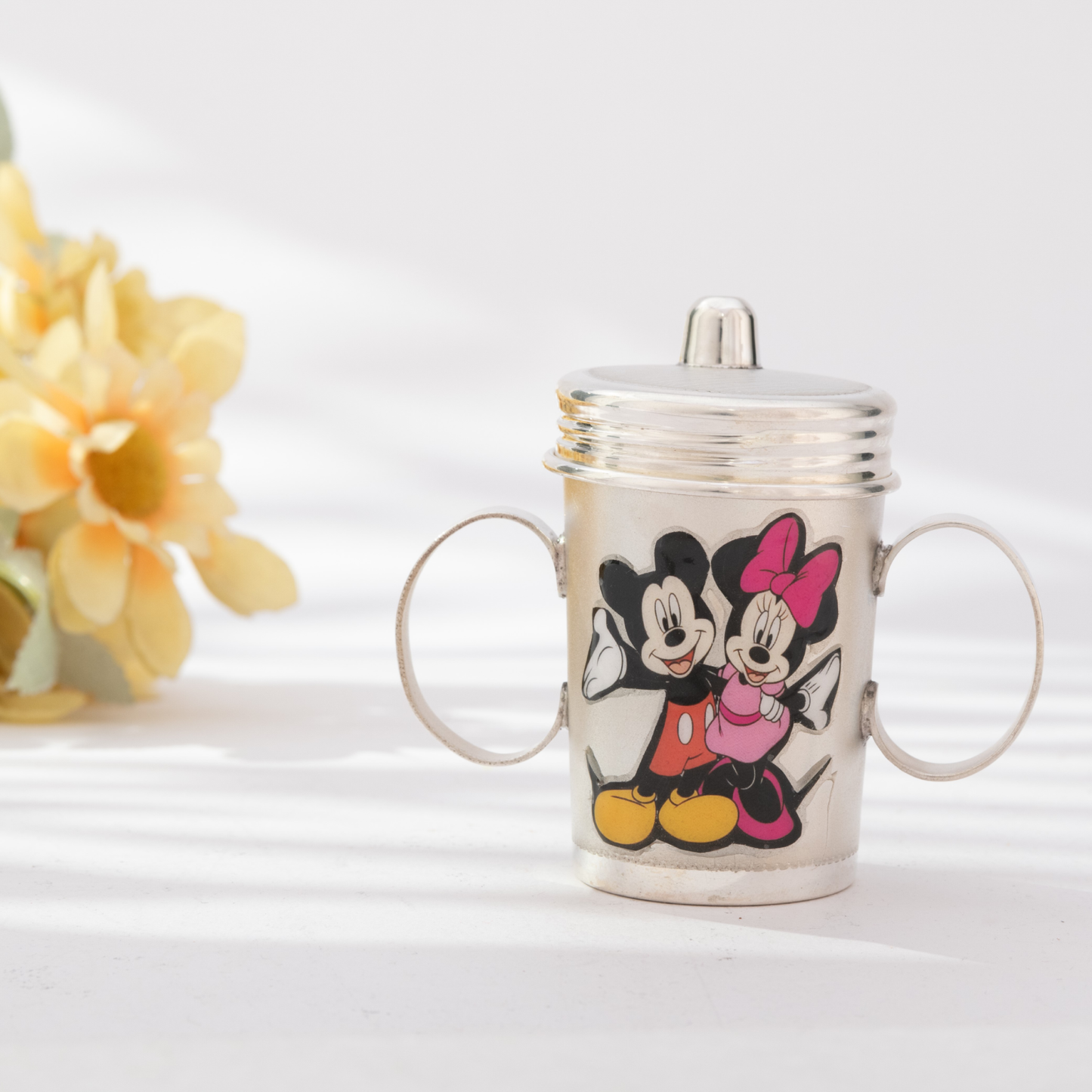 Graceful Silver Sipper Cup with Mickey Mouse and Minnie Mouse Design