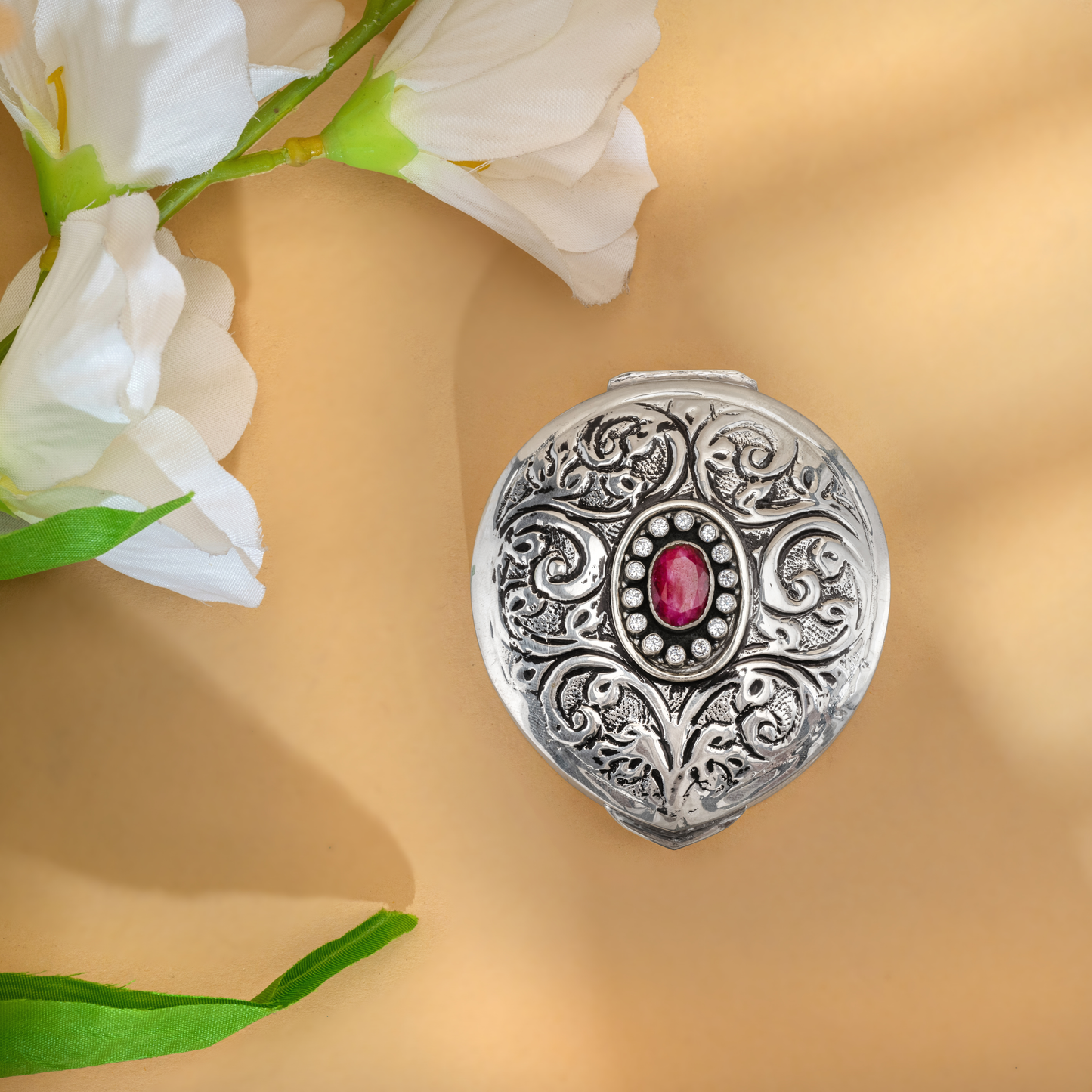 Handcrafted Antique Silver Chopra adorned with Elegant Semi-precious Stone