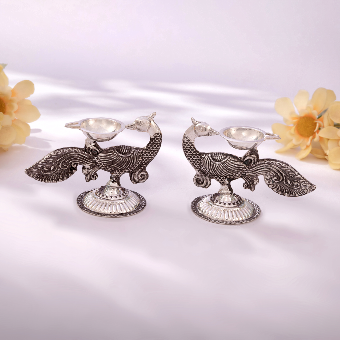 Handcrafted Antique Silver Peacock Diya Set with Elegant Nakshi