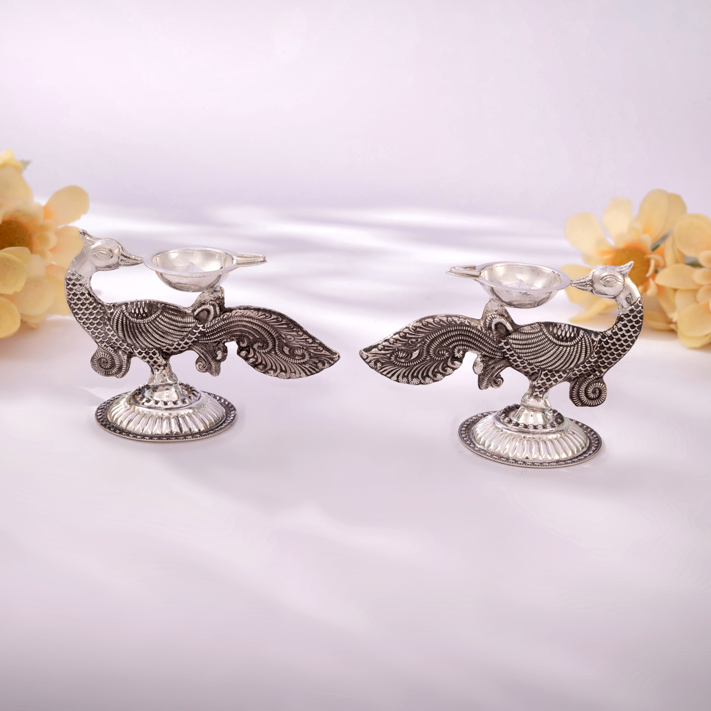 Handcrafted Antique Silver Peacock Diya Set with Elegant Nakshi