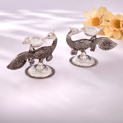 Handcrafted Antique Silver Peacock Diya Set with Elegant Nakshi