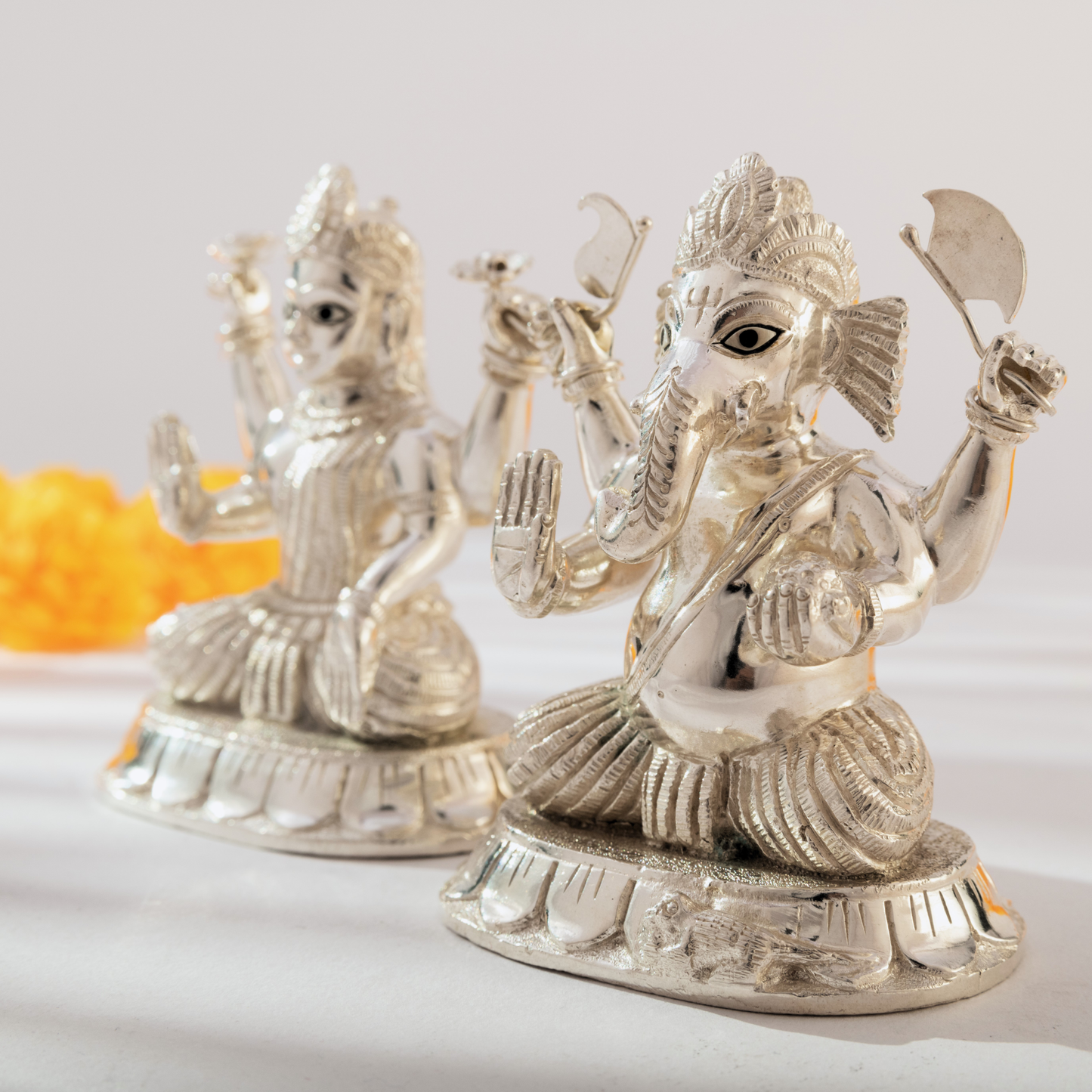 Lord Ganesh and Goddess Lakshmi Idol set in Sparkling Silver Finish