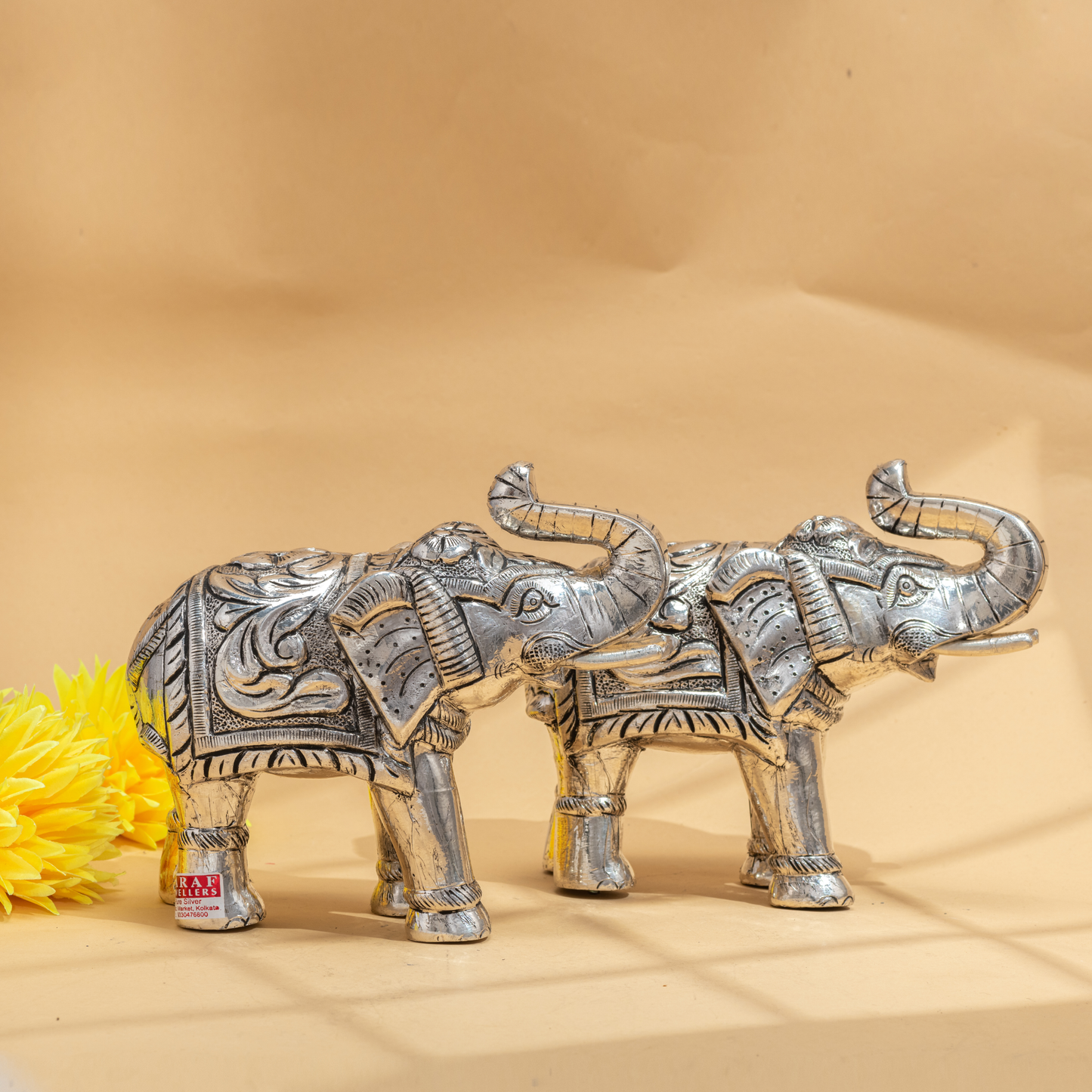 Regally Designed Pair of Silver Coated Elephants with Fine Engraving