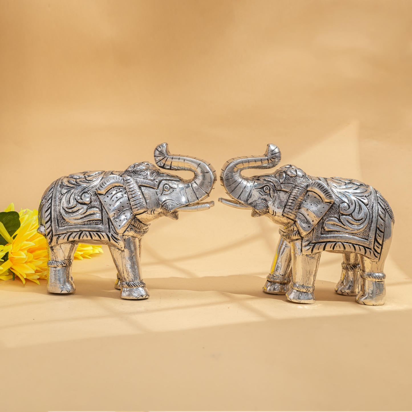 Regally Designed Pair of Silver Coated Elephants with Fine Engraving